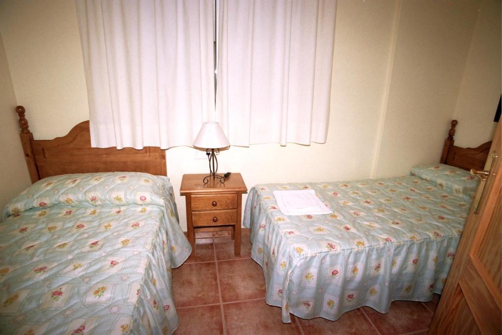 Apartamentos La Casa Del Barrio Маро Номер фото