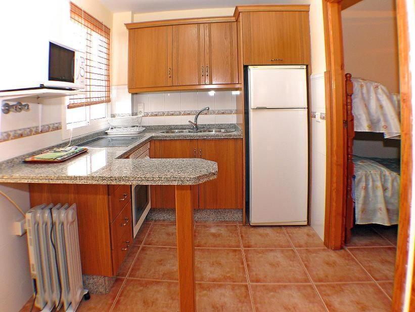 Apartamentos La Casa Del Barrio Маро Номер фото